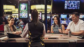 Experience the excitement of gaming at this vibrant entertainment space, where tables and slot machines await.