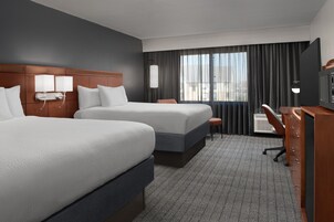 Premium bedding, individually furnished, desk, laptop workspace
