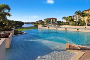 2 outdoor pools, pool umbrellas, pool loungers