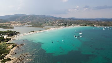 Private beach, white sand, free beach shuttle, sun-loungers