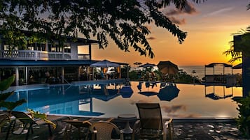 Outdoor pool, pool umbrellas, sun loungers