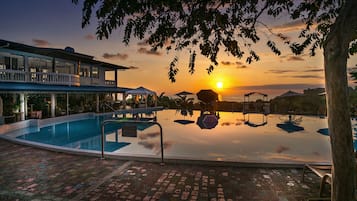 Outdoor pool, pool umbrellas, pool loungers