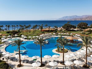 Indoor pool, outdoor pool, open 9:00 AM to 6:00 PM, pool umbrellas - Mövenpick Resort Taba (Taba)