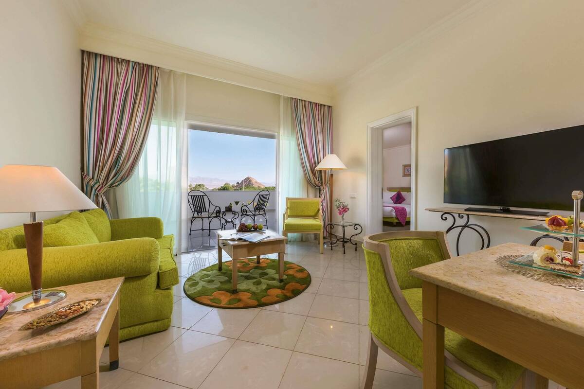 Family Room, 1 King Bed, Sea View | 1 bedroom, in-room safe, soundproofing, iron/ironing board