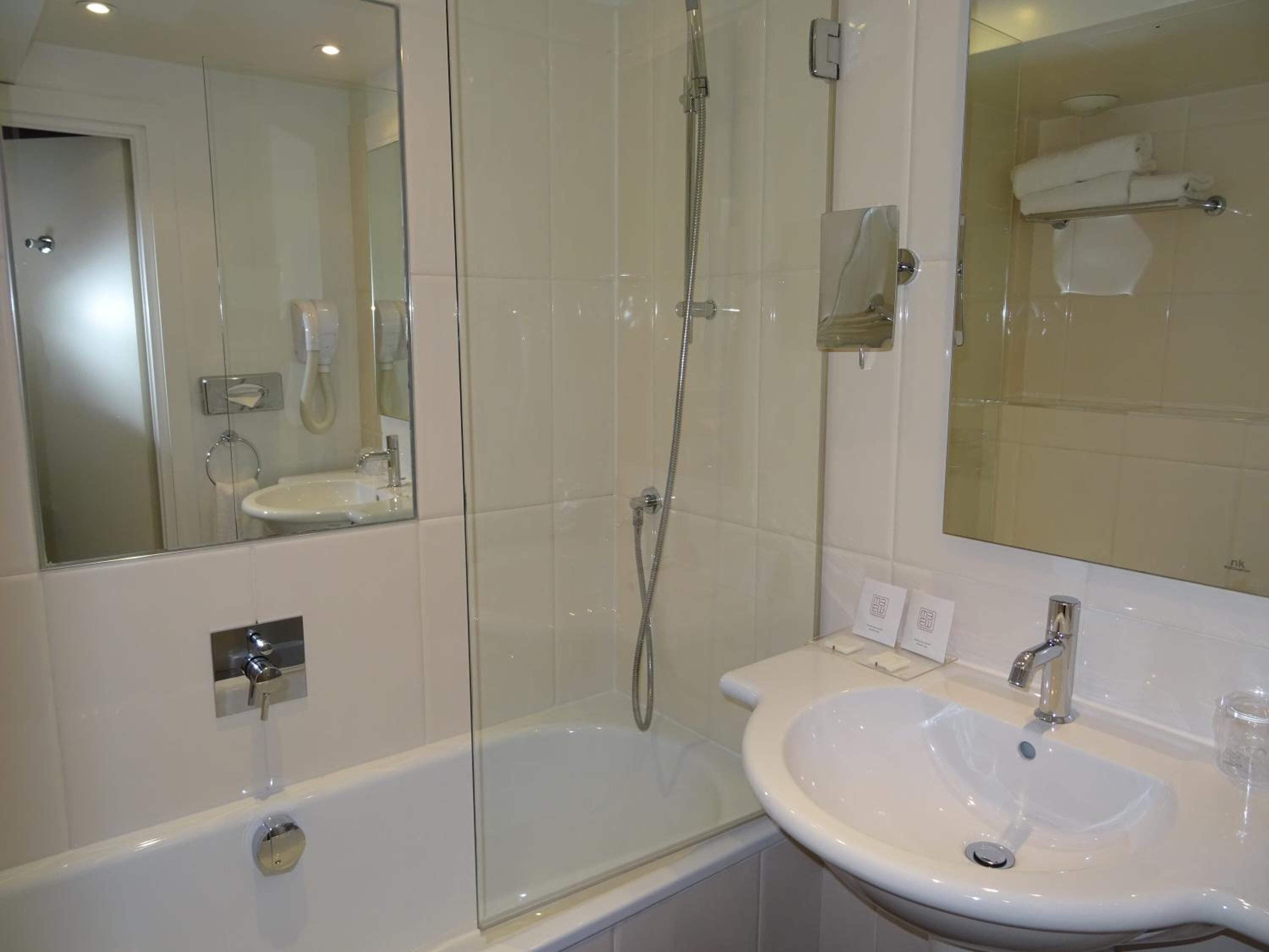 standard double or twin room | bathroom | hair dryer, bathrobes, slippers, towels