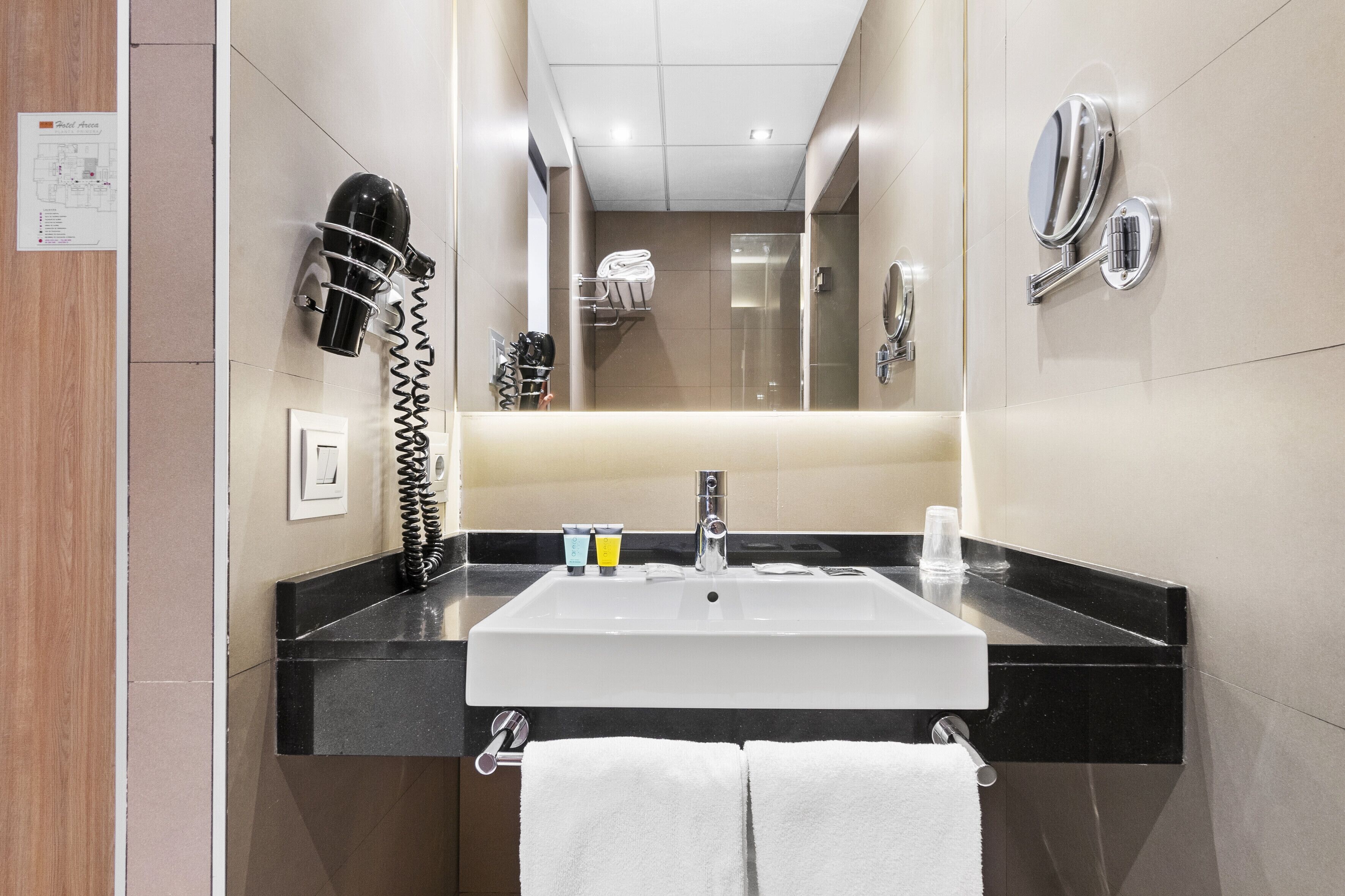 designer toiletries, hair dryer, bathrobes, towels