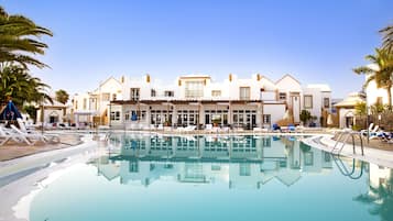 2 outdoor pools, open 10:00 AM to 6:00 PM, pool loungers