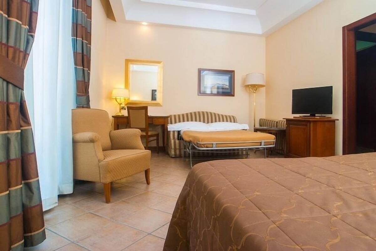 Deluxe Triple Room | Select Comfort beds, minibar, in-room safe, desk