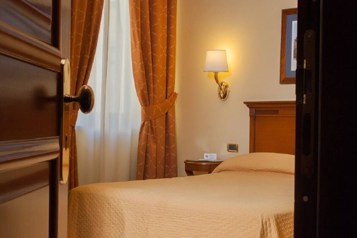 Economy Double Room | Select Comfort beds, minibar, in-room safe, desk