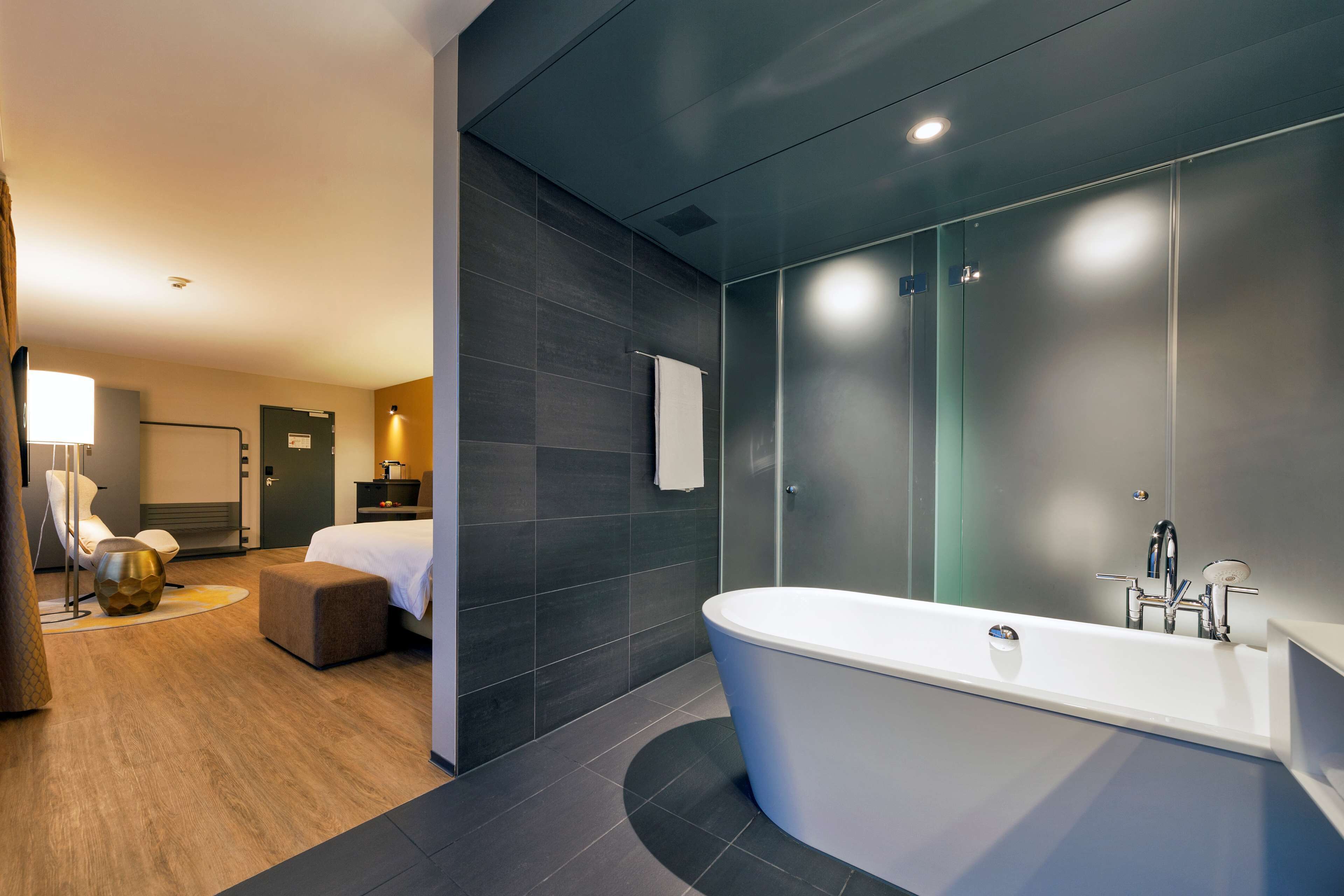 premium room | bathroom | eco-friendly toiletries, hair dryer, bathrobes, towels