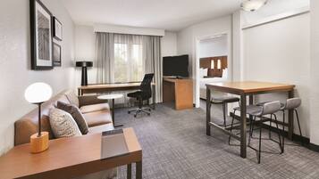 Flat-screen TV, pay movies