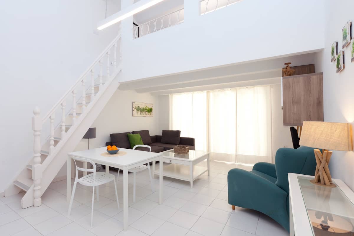Apartment, Terrace, Garden View | Living room | Flat-screen TV