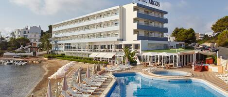 Indoor pool, outdoor pool, open 9:00 AM to 9:00 PM, pool umbrellas