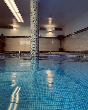 Indoor pool, outdoor pool, open 9:00 AM to 9:00 PM, pool umbrellas