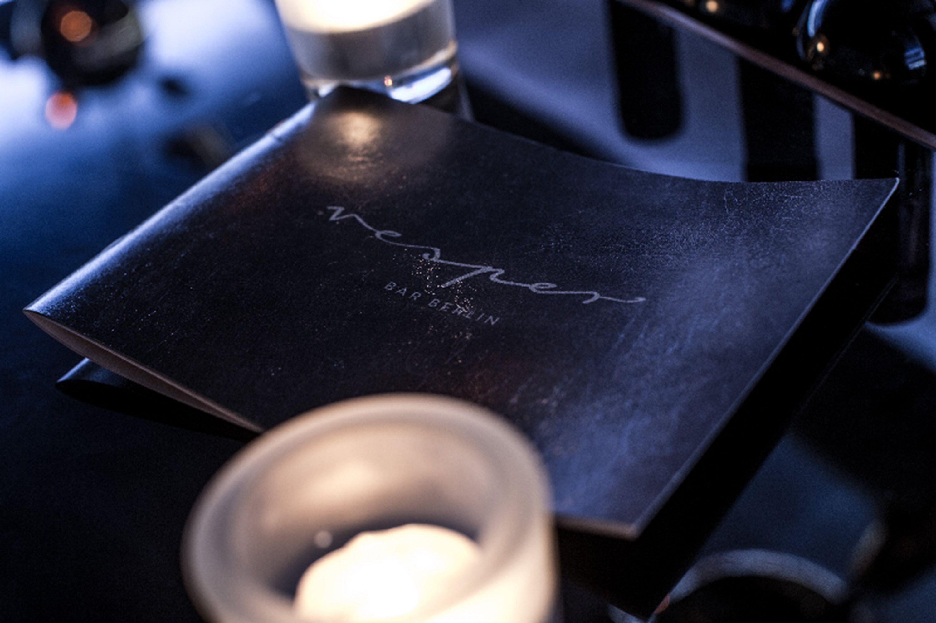 A black menu with the word "Verpien" and "BAR BEER" on it.