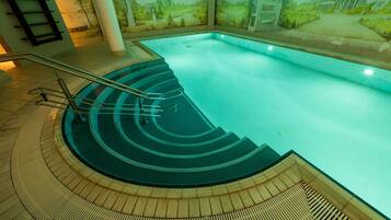 Indoor pool, sun loungers
