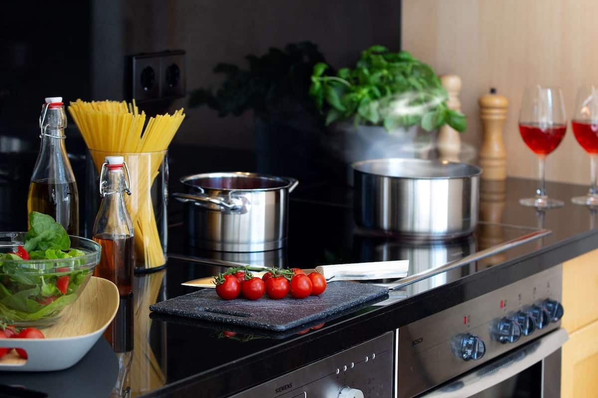 premium room | private kitchenette | full-sized fridge, stovetop, dishwasher, coffee/tea maker