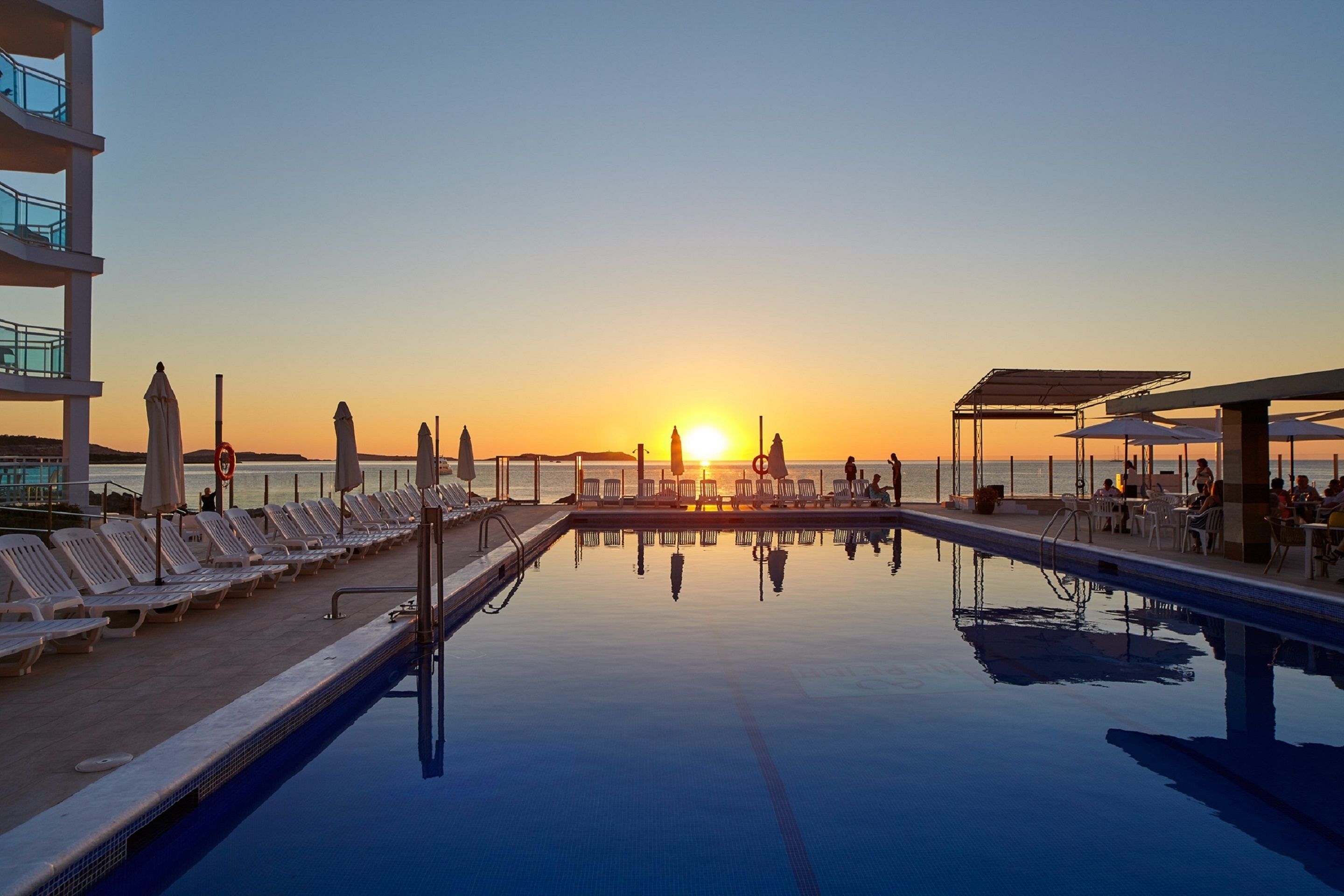 Outdoor pool, pool umbrellas, pool loungers