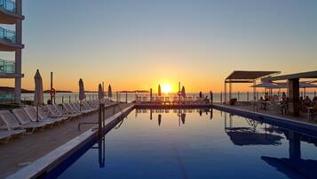 Outdoor pool, pool umbrellas, pool loungers