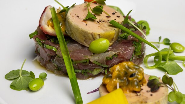 A dish with various ingredients and garnishes. - Boucan Canot (Saint-Paul)