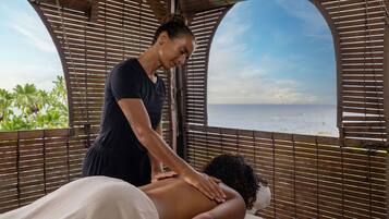 Experience a soothing massage with a breathtaking ocean view.