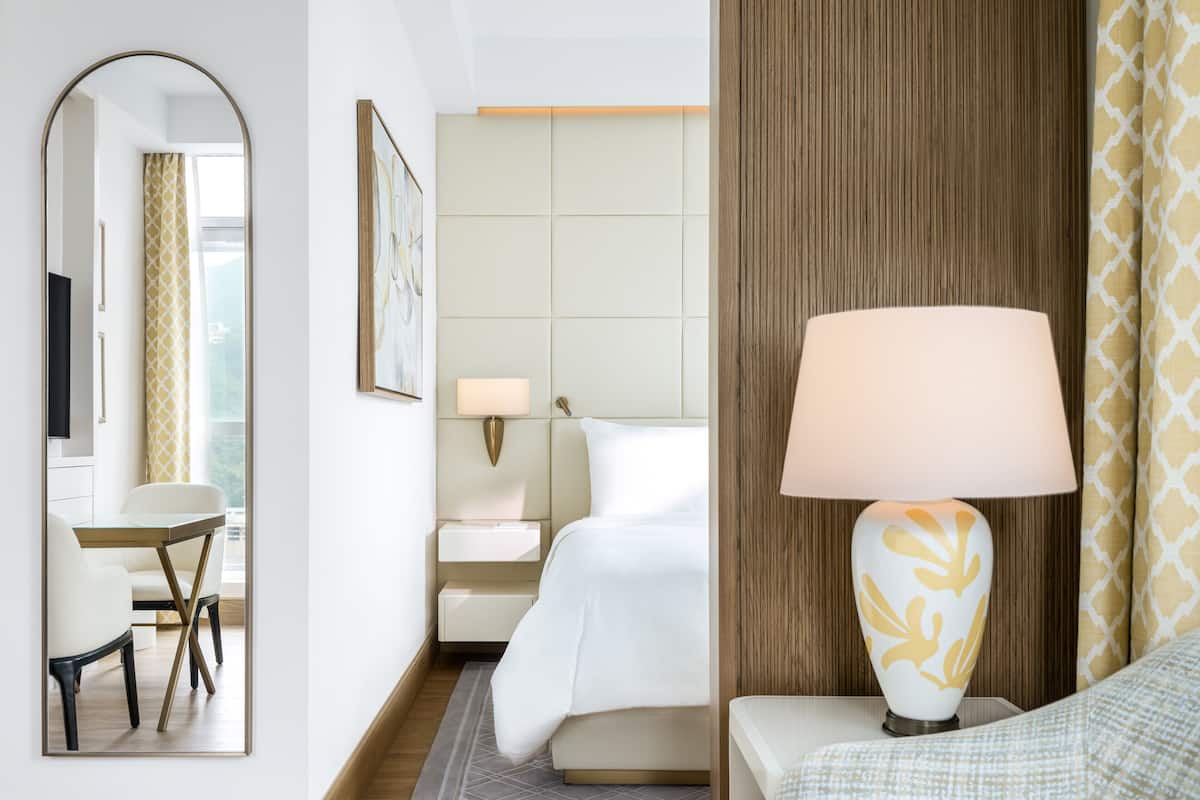 Premium bedding, pillow-top beds, in-room safe, laptop workspace
