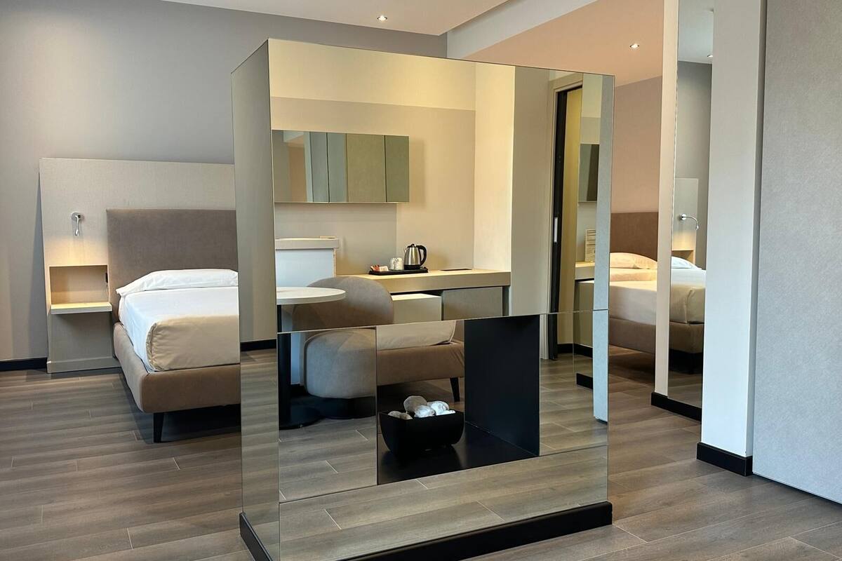 quadruple room (with private garage) | down duvets, minibar, in-room safe, individually furnished