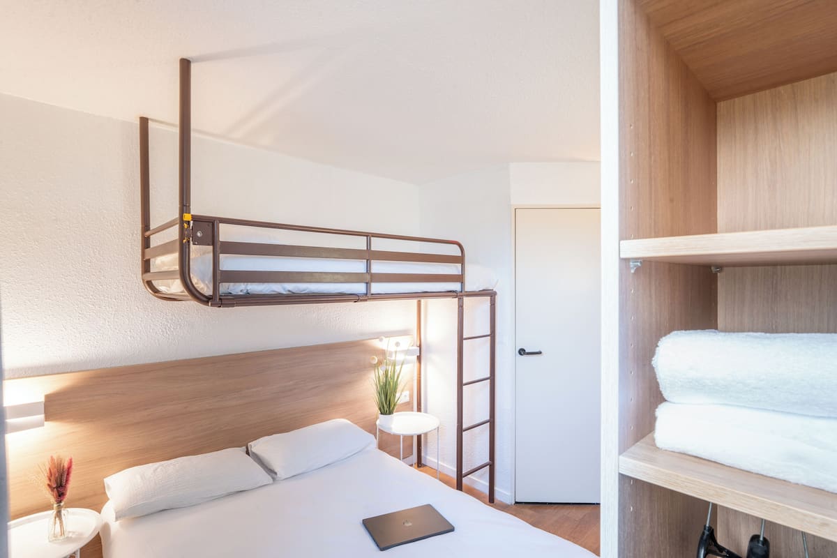 Desk, blackout curtains, iron/ironing board, free cots/infant beds