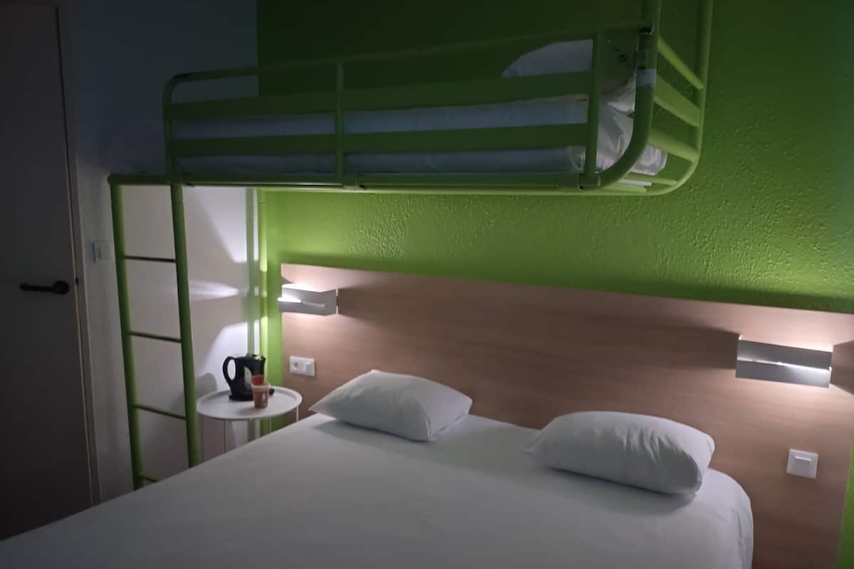 Family Triple Room, Multiple Beds | Desk, blackout drapes, iron/ironing board, free cribs/infant beds