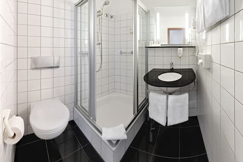 Shower, rainfall showerhead, eco-friendly toiletries, hair dryer
