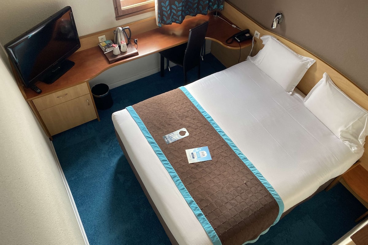 blackout curtains, soundproofing, iron/ironing board, free wifi