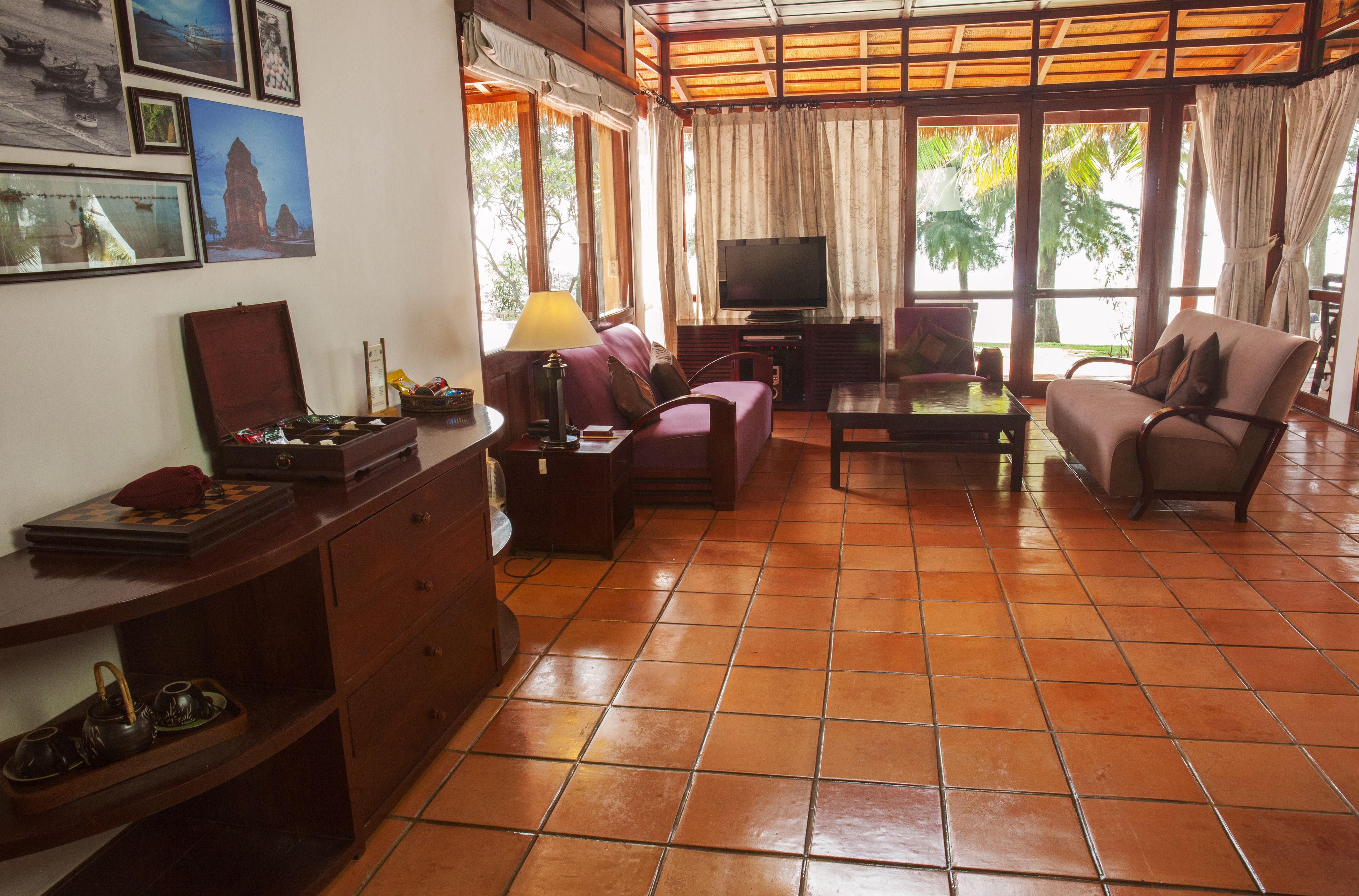 villa, private pool | living area | 32-inch flat-screen tv with cable channels
