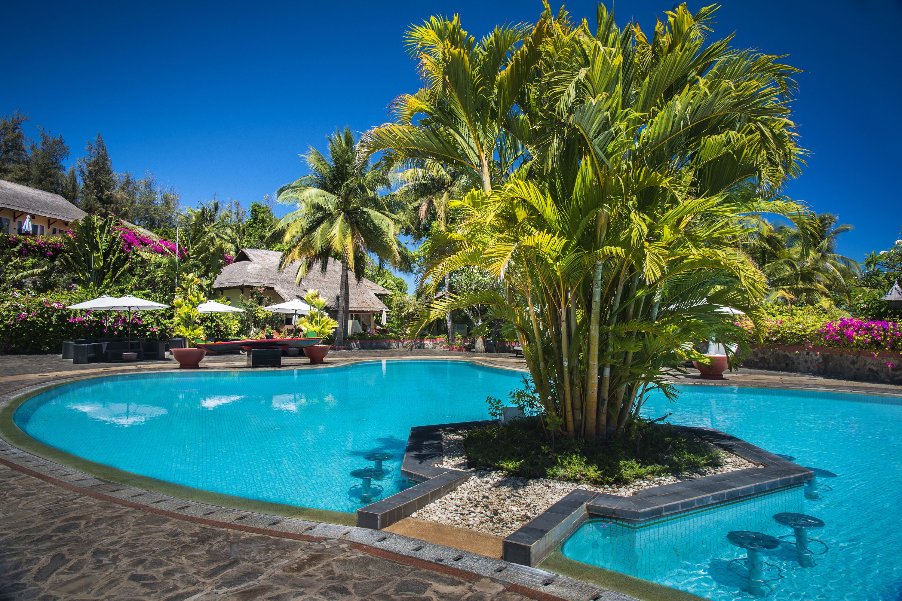 2 outdoor pools, pool umbrellas, pool loungers