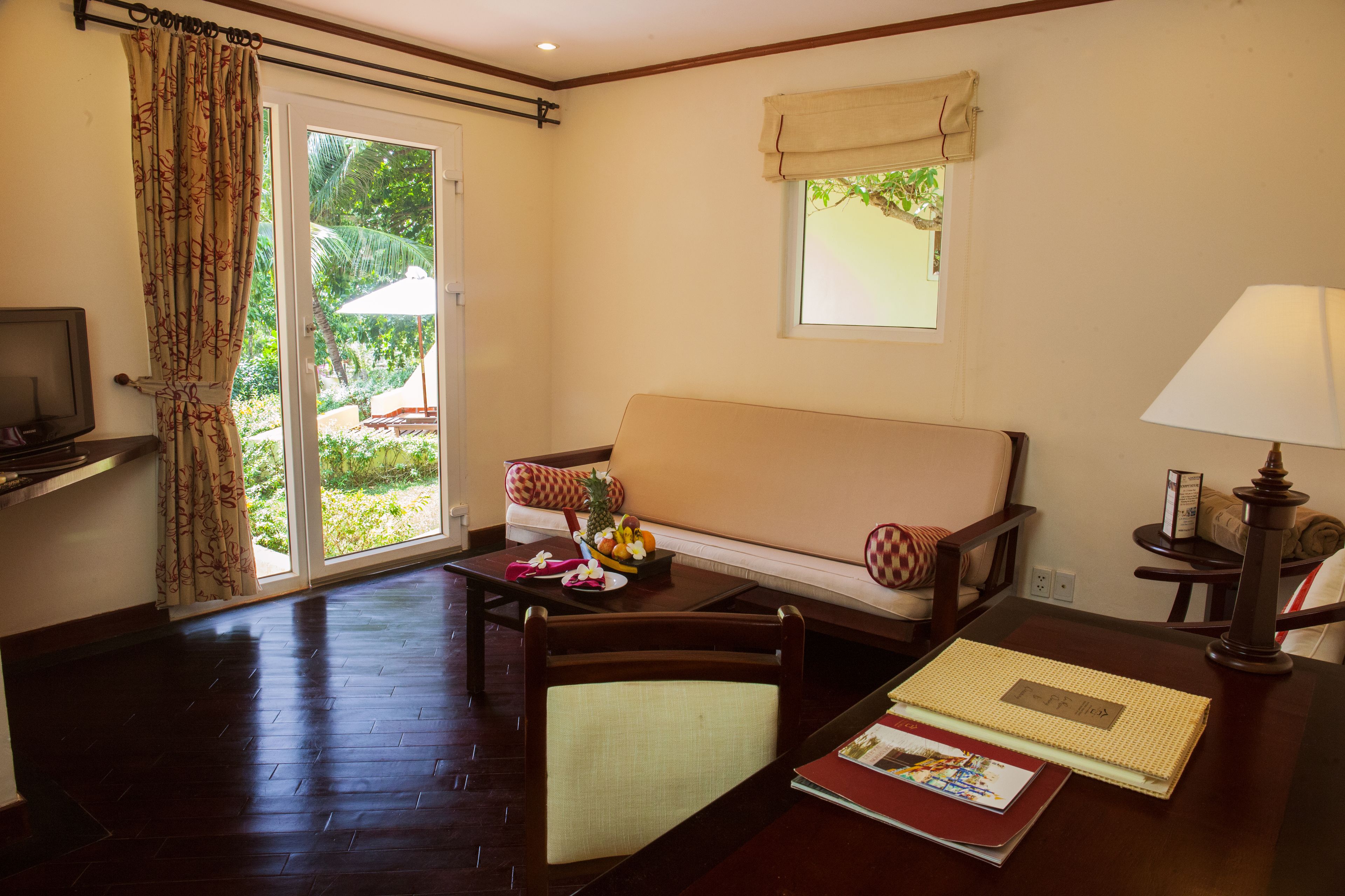 family bungalow | living area | 32-inch flat-screen tv with cable channels