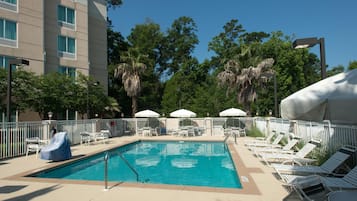 Outdoor pool, pool umbrellas, sun loungers