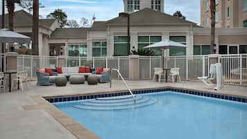 Outdoor pool, pool umbrellas, sun loungers