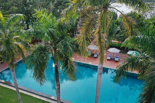 Outdoor pool, pool umbrellas, pool loungers