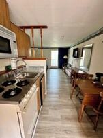 Standard Room, Kitchenette, Waterfront | Individually decorated, individually furnished, iron/ironing board
