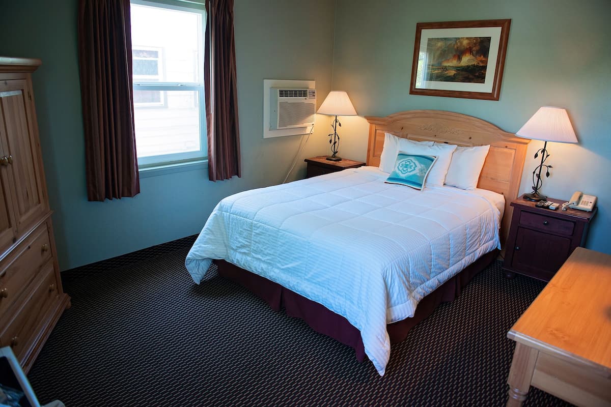 Room, 1 Queen Bed | Living area | DVD player