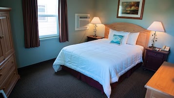 Quarto, 1 cama Queen | Área de estar | DVD player