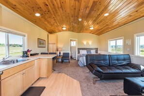 King Honeymoon Cottage, Large Jetted Tub, Private | Living area | 35-inch flat-screen TV with cable channels, TV, DVD player