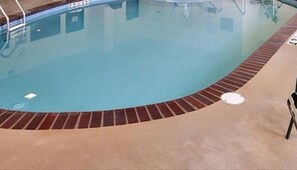 Indoor pool, open 6:00 AM to 11:00 PM, pool umbrellas, sun loungers