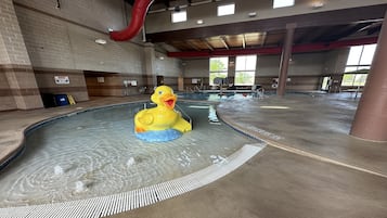 Indoor pool, open 6:00 AM to 11:00 PM, pool umbrellas, pool loungers