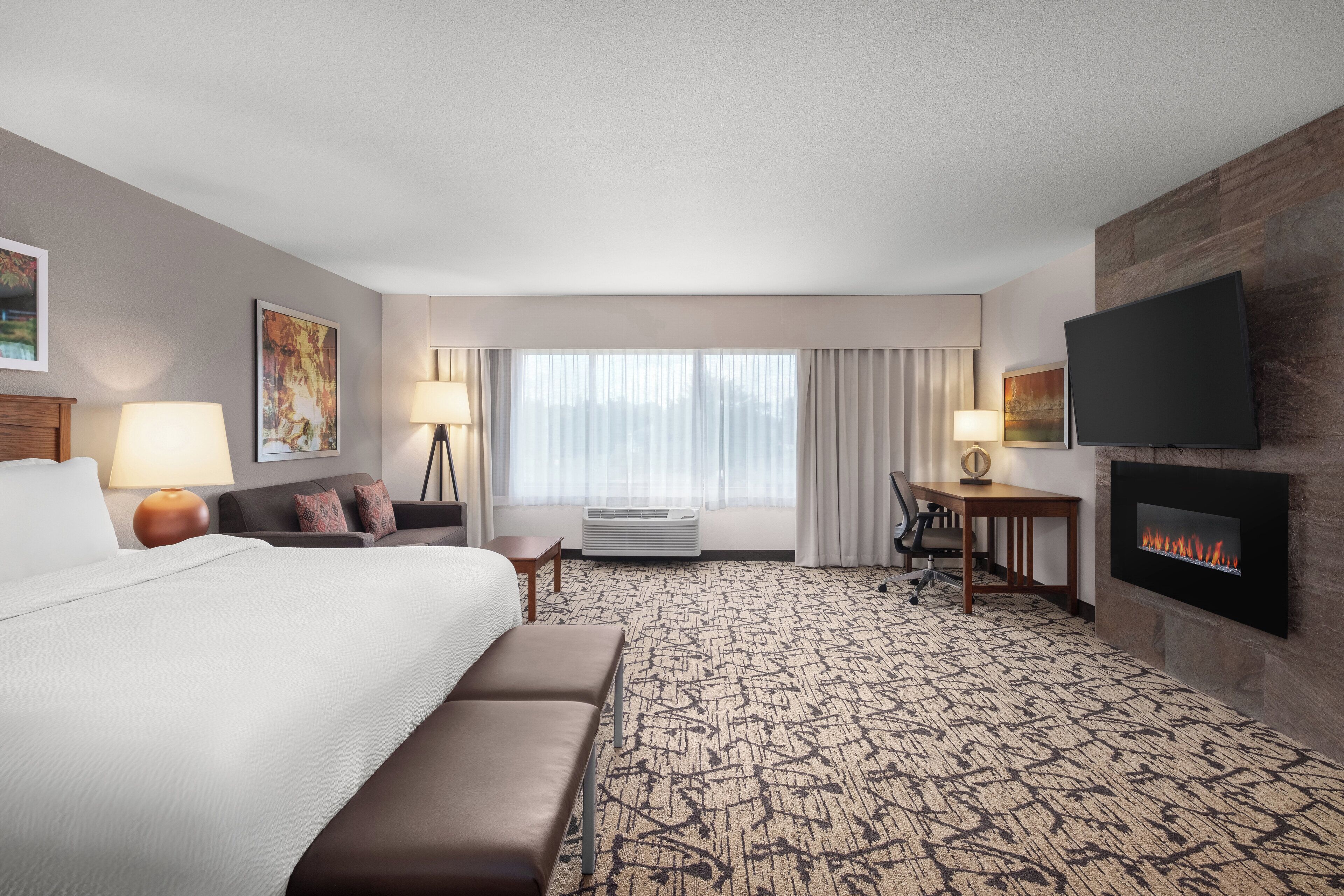 Suite, 1 King Bed | Desk, laptop workspace, blackout curtains, iron/ironing board