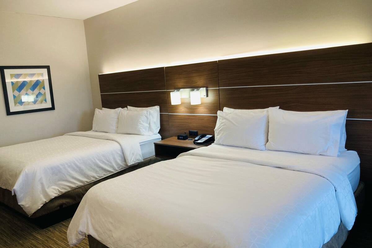 suite, multiple beds | in-room safe, desk, blackout curtains, iron/ironing board