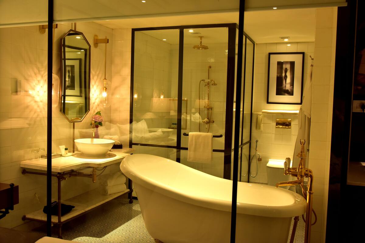 eco-friendly toiletries, hair dryer, bathrobes, slippers