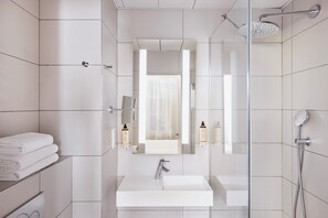 Shower, eco-friendly toiletries, hair dryer, towels