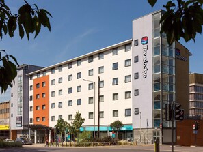A Travelodge hotel with a modern facade, multiple windows, and a prominent Travelodge sign. - Travelodge Norwich Central (Norwich)