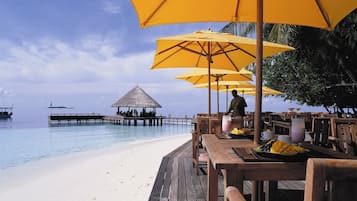 On the beach, white sand, free beach cabanas, sun loungers