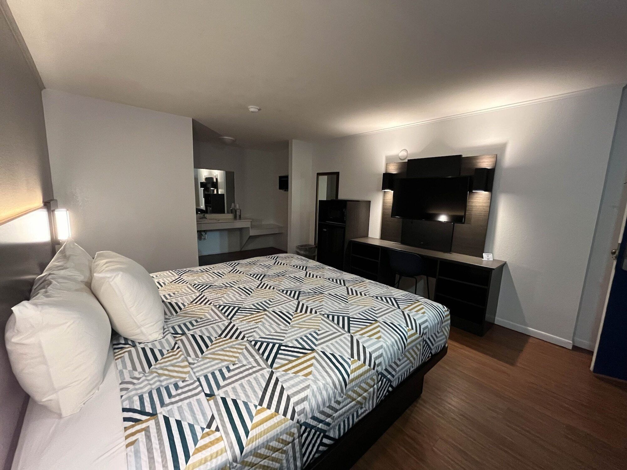 Desk, laptop workspace, blackout drapes, soundproofing